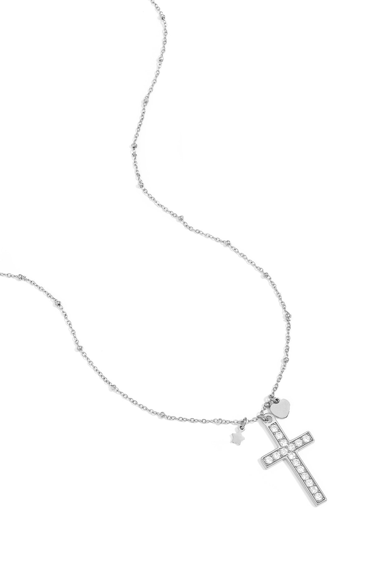 Necklace with decorated cross pendant and charms